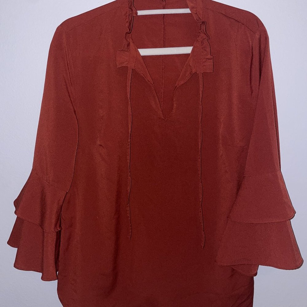 Banana Republic blouse. Burnt orange. Size Large